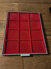 A LINDNER COIN STACKING STORAGE TRAY