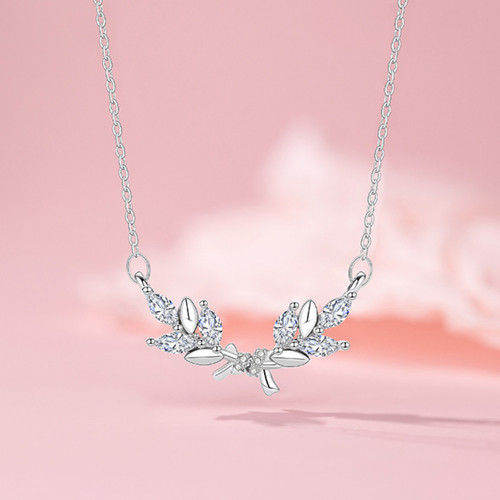 Dainty cross bow pave - pave, cz