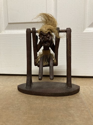 Tribal carved figure a - on,