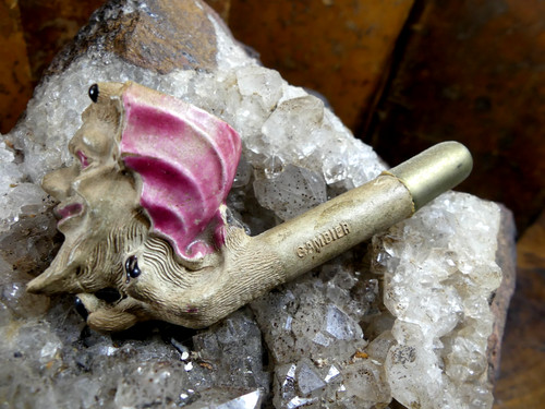 Gambier carved and enamelled - and,
