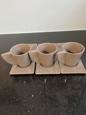 A Set Of Three Retro Ceramic