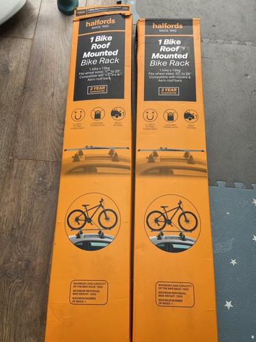 Two halfords roof mounted bike - halfords,