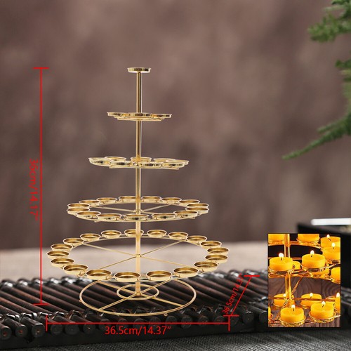 Heads gold candle stand - 49,
