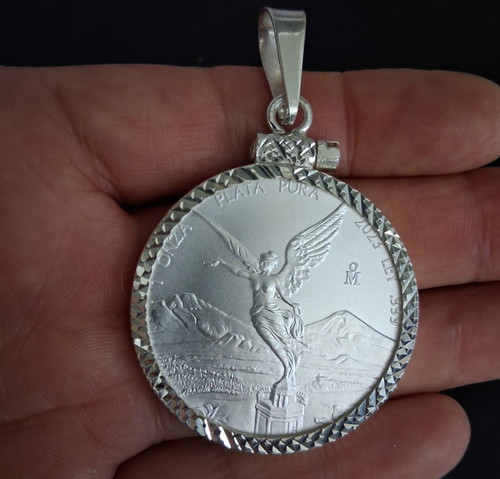 Moneda onza bizel - de,