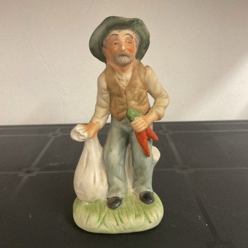 Porcelain old man figurine - old,