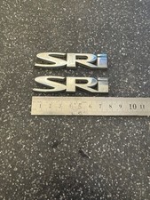 2x VAUXHALL SRI BADGES ASTRA