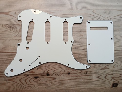 Genuine fender strat pickguard - fender,
