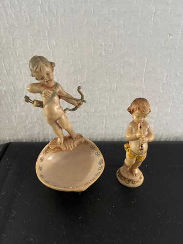 Depose cherubs these are - 2, cherubs.(these