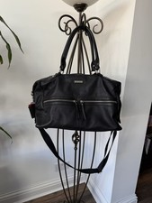 storksak changing leather bag