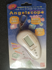 Rare Bandai 1997 Angelscope - tamagotchi type virtual pet - in packet
