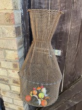 AN OLD FISHING KEEPNET WITH