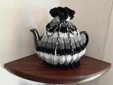 Hand Knitted Black White And Grey Tea Cosy