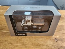 1:50 Scale Mercedes-Benz 'Trucks You Can Trust' Unimog U430 White Flatbed
