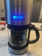 Cook works Coffee Machine