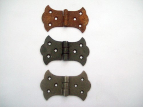 Ornate butterfly cast iron - x,