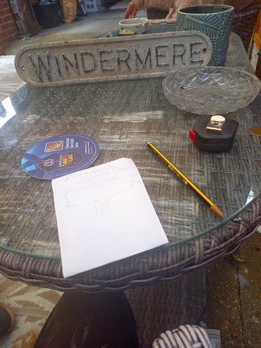 Windermere metal house - house, sign