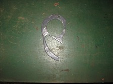 AN ORIGINAL TR4 HANDBRAKE GAITER PLATE