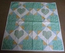 Various Green Hearts Lap Quilt