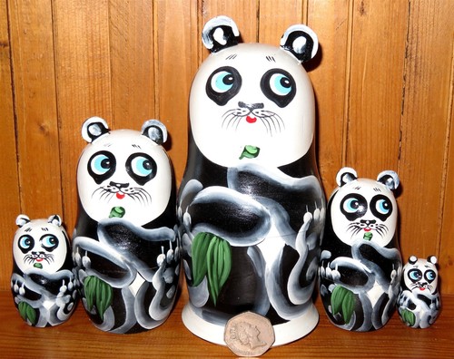 Panda nesting dolls hand - dolls,