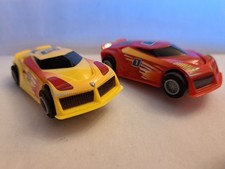 NEW STYLE MICRO SCALEXTRIC 9 VOLT RED AND YELLOW CARS