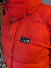 RAB Puffer down filled expedition jacket in Orange with removable storm hood