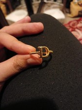 Gold letter D ring