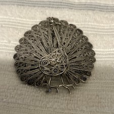 Large White Metal  Peacock Brooch Swirling Filigree Design Tail Feather Train