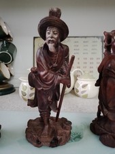 THREE ANTIQUE HAND CARVED