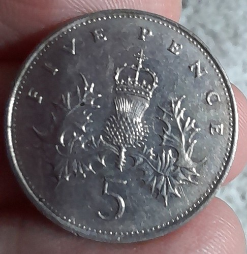 Old and pence coins - and,