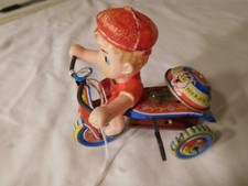 Vintage Early Japan Wind-Up Trike with Bell & Boy Pedaling