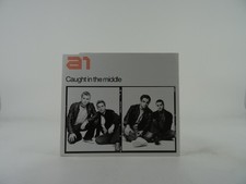 A1 CAUGHT IN THE MIDDLE (B49)