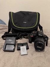 Nikon D5600 DSLR Camera with 18-55mm Lens, UV Filter, 2 Batteries & Camera Bag 