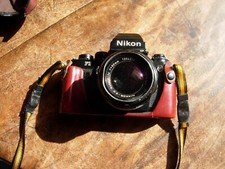 Nikon F3 HP 33mm film camera and 50mm 1:1.4 nikon lens and leather case