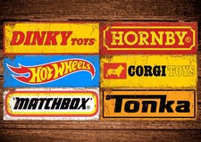 Toy store metal signs, hot wheels, dinky, corgi, tonka, matchbox,hornby.