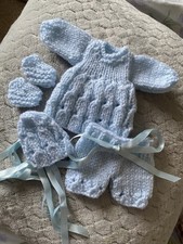 Hand Knitted dolls clothes to
