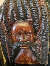 RASTA HAND CARVED MAN WEIGHS 6