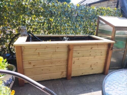 Raised garden pond wooden fish - raised,