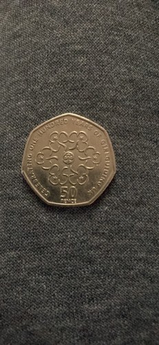 50p coin celebrating - 50p,