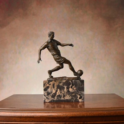 Football player statue - football,