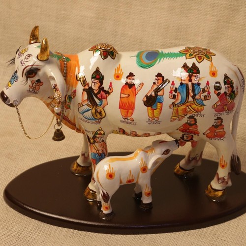 Ceramic handpainted cow and - cow,