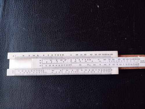 Mini slide rule - ., inches