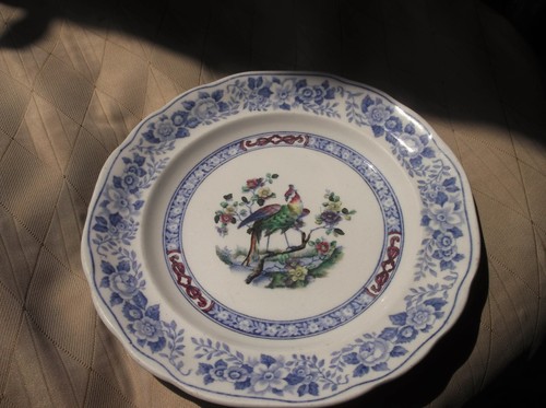 Lovely old side plate - side,