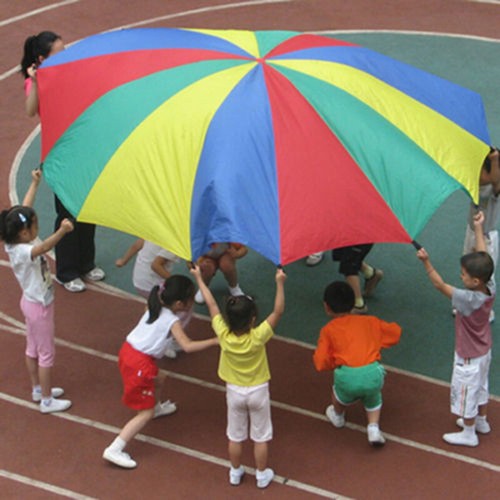 Large kids play parachute - play,