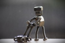 Dad Mowing The Lawn Sculpture