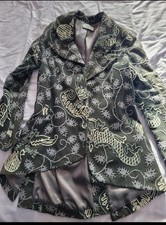 Stunning designer frock coat. Purple embroidered statement piece