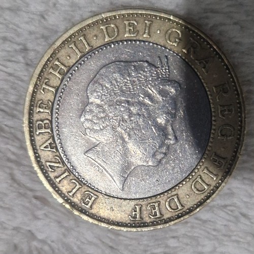 1999 pound coin with - 2, mint