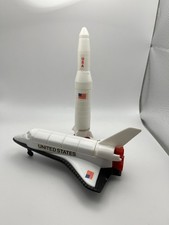 Vintage 1980s moon space shuttle and moon rocket toy set