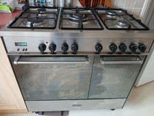 Gas double oven. Dlhongi with