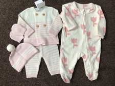 Bundle of baby girls warm