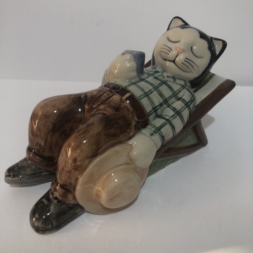 Cat gardener sleeping - cat, quail